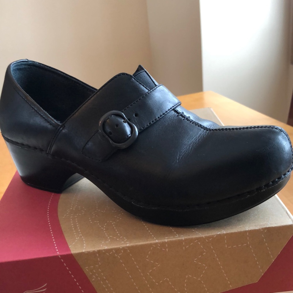Dansko Tamara buckle leather clog. Some signs of wear.